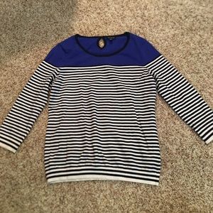 Blue and black and white striped sweater